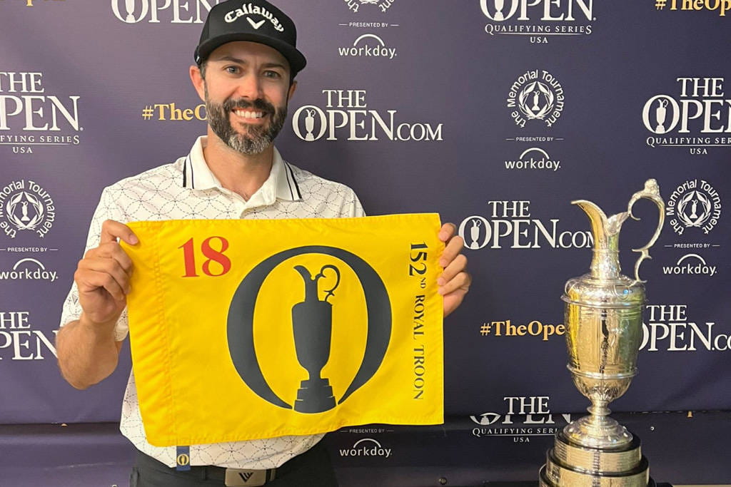 Adam Hadwin poses with the Claret Jug and a pin flag after qualifying for The 152nd Open at the Memorial Tournament